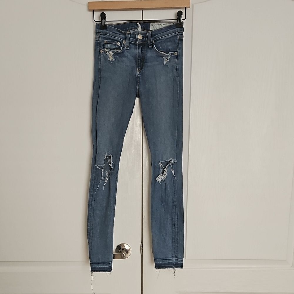 Women's Blue Distressed Jeans With Raw Hem